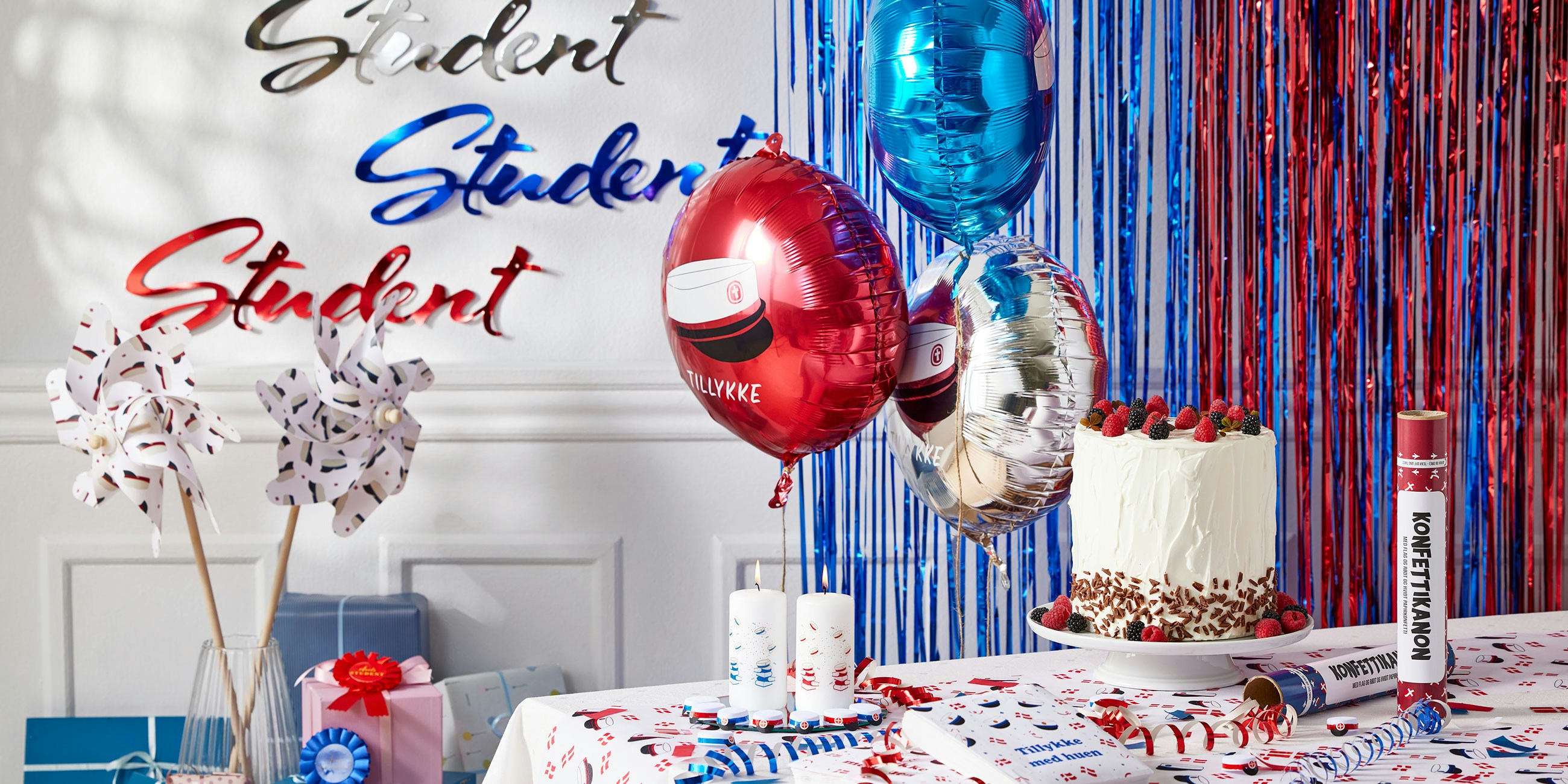 Et bord pyntet op til studentergilde. Køb studenter pynt på Bilka.dk